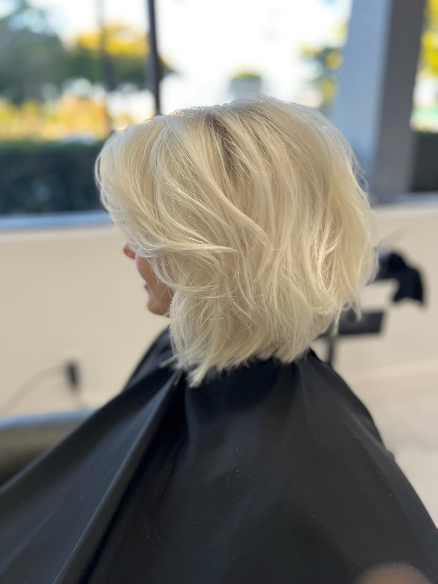 Rich copper gloss on shoulder-length hair